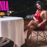 Milfania Adult Game by Dr.Phoenix – Episode 6.5b 3D adult game artwork showing a confident mature woman and young male protagonist in a modern home setting